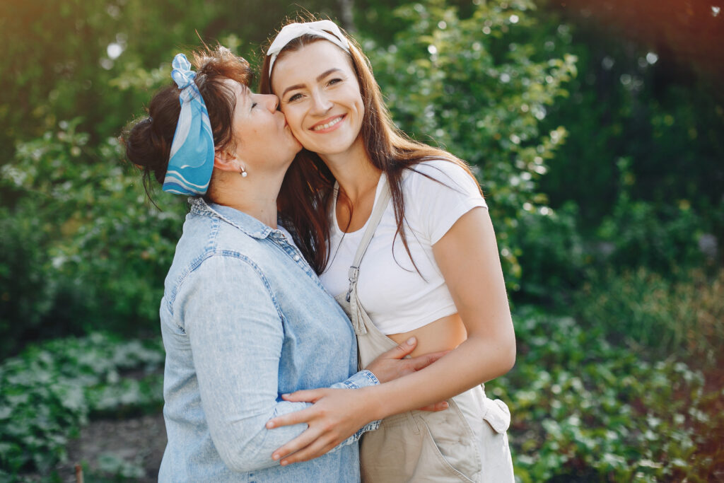 beautiful women works in a garden near the house