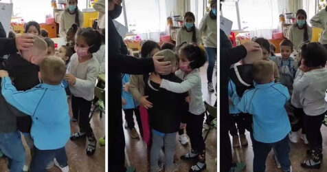 Viral video of a little Ukrainian child in Madrid being hugged by his new classmates